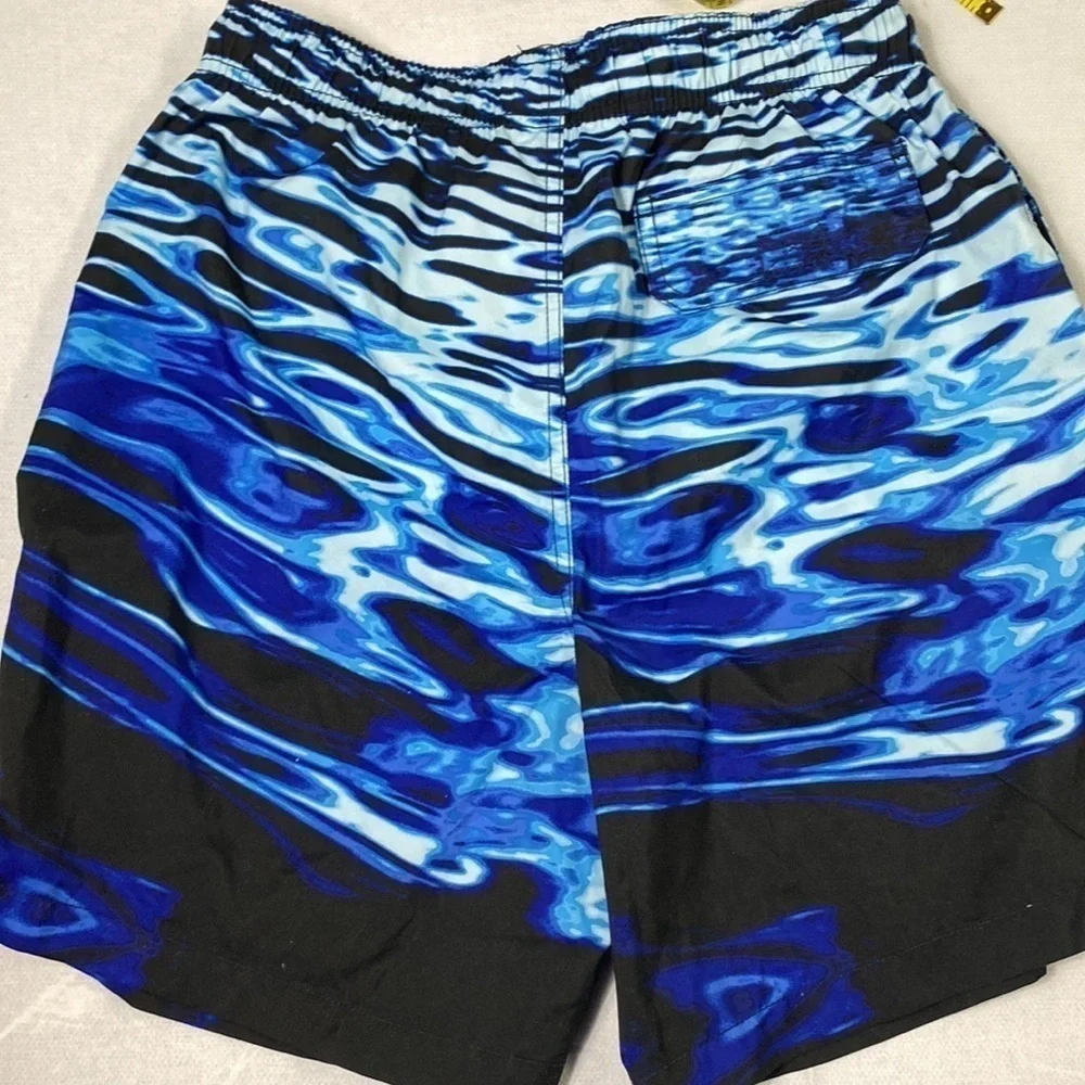 Joe Boxer Men’s Swim Trunks size Medium. (BE)